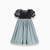 The KIKI and JOJO Girls Velvet Puff Sleeve Dress with Rhinestone Trim in forest green features a luxurious velvet bodice, short puff sleeves, and a flared skirt—ideal for special occasions and displayed on a white background.