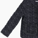 The KIKI and JOJO Girls Vintage Beaded Tweed Jacket in gray features long sleeves, vintage-inspired elegance, beaded detailing, and two front pockets—sophisticated children’s outerwear shown on a plain white background.