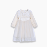 The KIKI and JOJO Girls Vintage Lace Satin & Tulle Dress in beige features long sleeves, a round neckline, fitted bodice, flared skirt, and delicate hand-embroidered floral details, displayed against a white background.